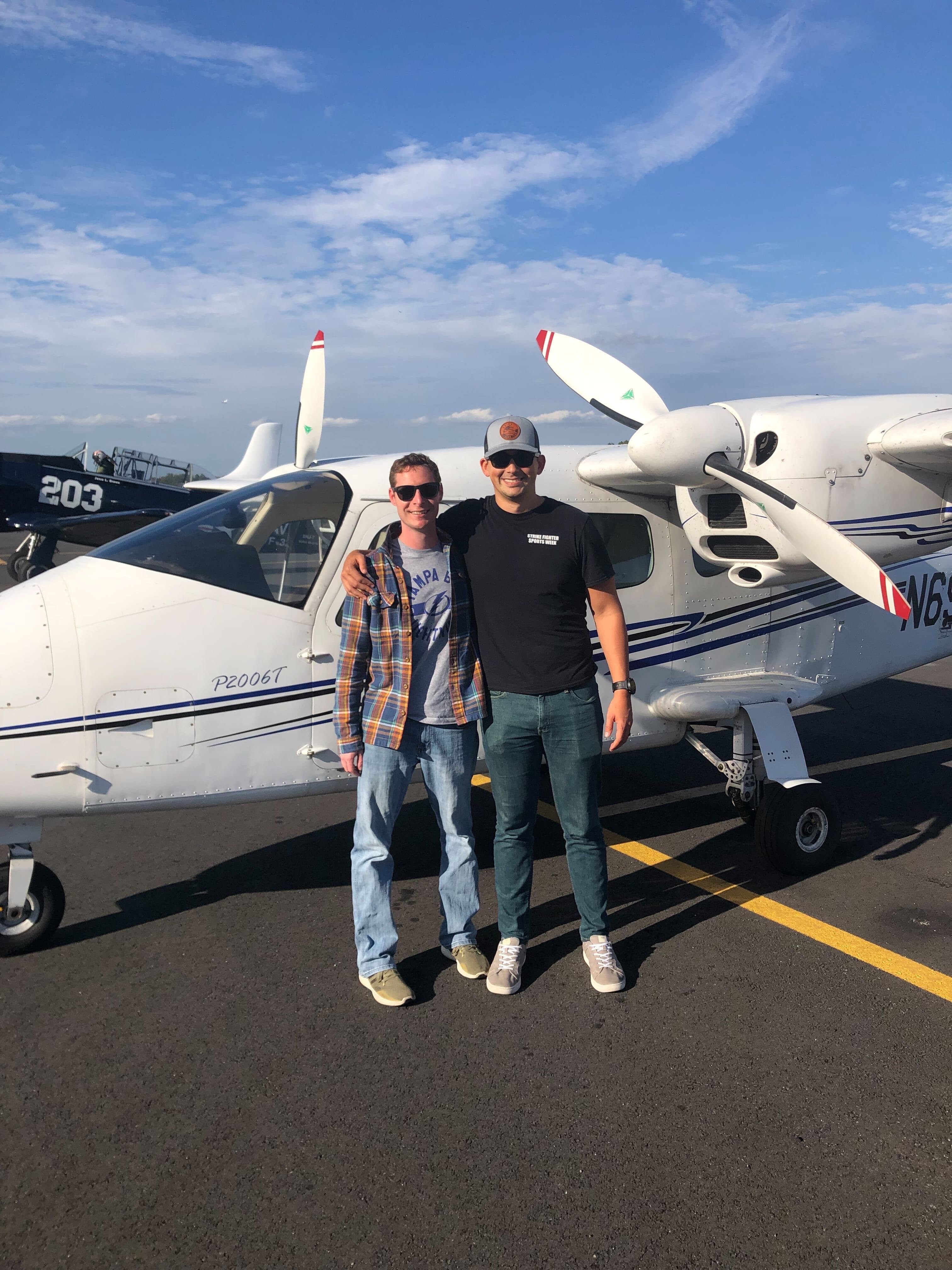 Flight instructor with student